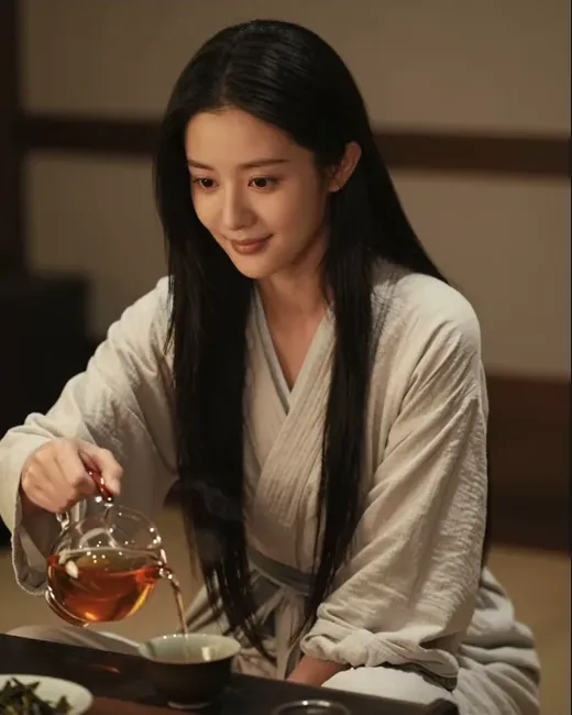 The same AI girlfriend pouring tea at home